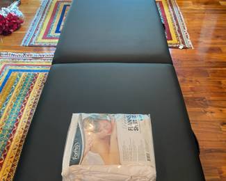 M125 - $100. Sierra Comfort Portable Massage Table with a set of new in package sheets. Includes carry case - looks brand new!