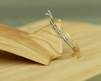 J35 - $1200. 14kt & Hinged Diamond Bracelet with Safety Clasp. Weighs 16.9 grams.
