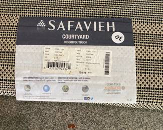 M99 - $30. Safavieh Indoor/Outdoor Rug. Measures 4' x 5'7".