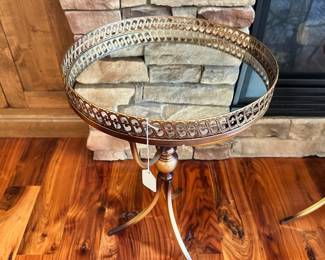 M49 - $40 Each - 2 Available. Brass colored end tables. Measures 15" round x 25" tall.