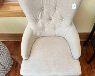 M55 - $30. Neutral small side chair. Measures 22" wide x 19" deep x 32" tall. Small Stain.