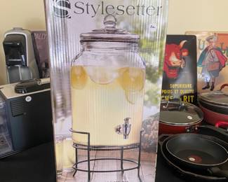 M117 - $20. Beverage Dispenser glass with metal stand.
