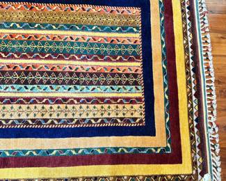 M26 - $350. Gorgeous colorful Topkapi Wool rug. Measures 51" x 75".