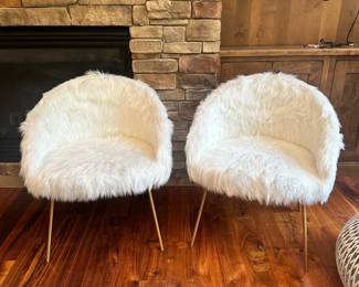 M45 - $250. Faux fur side chairs. 2 available. Measures 28" wide x 18" deep x 32" tall.