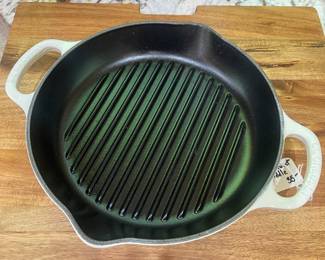 M5 - $35. Le Crueset 10" griddle pan.
