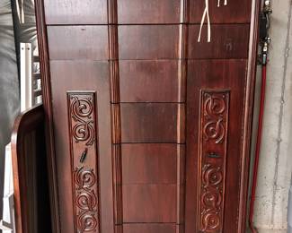 M82 - $150. 2 doors on the sides open. 5 drawers in the middle. 2 long drawers on the top.