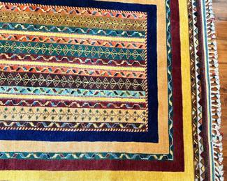 M26 - $350. Gorgeous colorful Topkapi Wool rug. Measures 51" x 75".