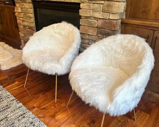 M45 - $250. Faux fur side chairs. 2 available. Measures 28" wide x 18" deep x 32" tall.