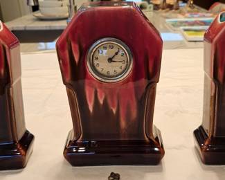 Orchies France Oxblood Ceramic Clock with garniture vases, early 20th century