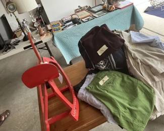 Russian Rocking Horse, many mens t-shirts, sport coats / shirts, and a few shoes.