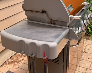Weber Genesis Gas Grill with Copper Colored Grill Top and Cabinet Doors in excellent condition