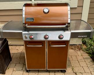 Weber Genesis Gas Grill with Copper Colored Grill Top and Cabinet Doors in excellent condition