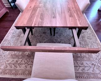Crate & Barrel Lakin Teak Extendable Dining Table with 2 Leaves. Shown with 6 Room & Board Peyton Dining Chairs