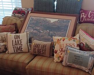 Sofa, pillows and artwork