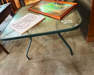 Glass top patio table, with art