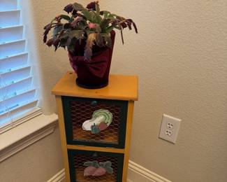 Live Cactus sitting on Small Hen Storage Cabinet