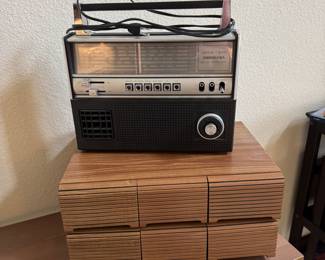 Radio on Top of Cassette Tape Holder (Filled with Cassette Tapes)