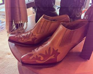 Pair of leather booties by CHARLIE HORSE.