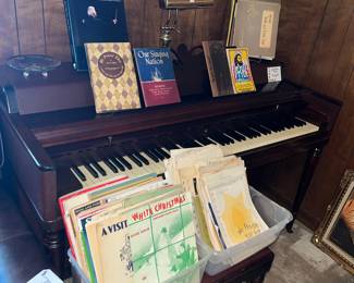 WURLITZER spinet-style piano, bench & sheet music