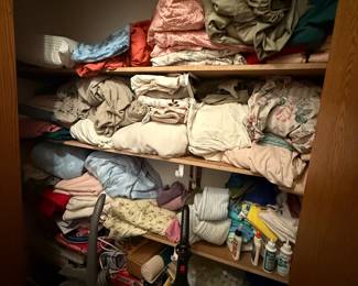 Linen Closet with sheets,  blankets etc.