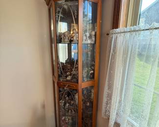 Corner Curio Cabinet.   (Contents are sold separately)