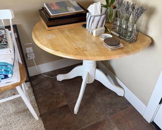 Maple drop leaf table with two white chairs