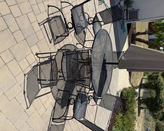 black wrought iron table and chairs