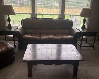 Leather couch, chair and ottoman Corner. Coffee table and matching ends