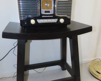 Saddle stool and retro radio/Cd player.