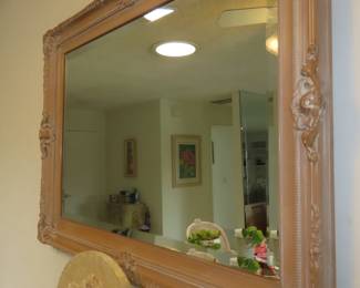 Blonde oak framed mirror.