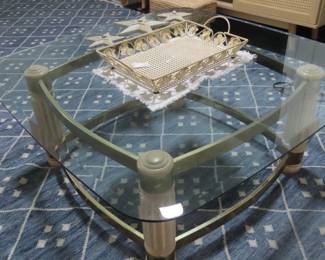 Glass and brass coffee table.