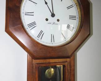 Seth Thomas chiming wall clock.