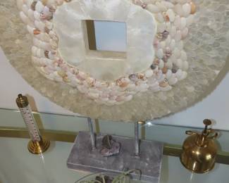 Shell decorative art, amethyst crystal with air plant.