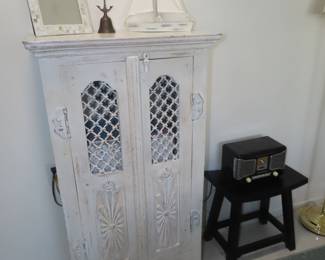 Shabby chic wooden cupboard.
