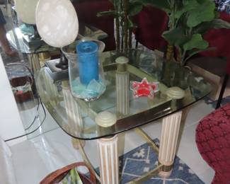 Glass and brass end table.