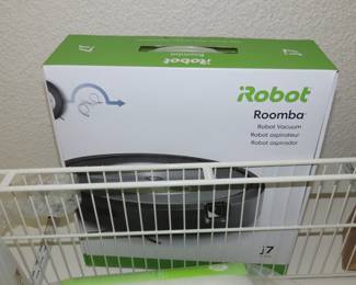 iRobot Roomba vacuum with box.