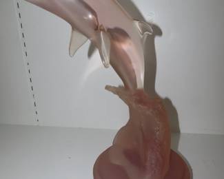 Pink acrylic/lucite dolphin. Donjo
