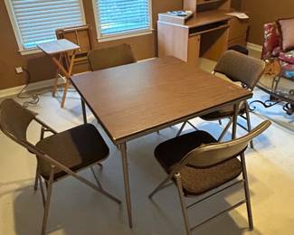 Vintage Samsonite card table with 4 chairs . 50.00 for table and chairs