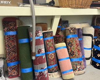 Loads of area and hall rugs and rug scraps - our client was a rug maker for 50 years!