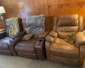 Three theater chairs