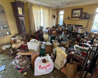 Grandfather clock plus several other antique clocks