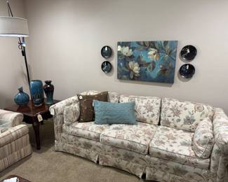 Lovely Sofa, decorative pillows, lamps, End Tables and wall decor