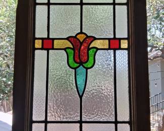 Pair of matching stained glass windows