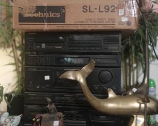 Vintage stereo equipment and Record player in original box! Large MCM Dolphin, Elephant, and tall giraffe.