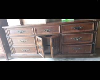 This cool large piece has been stored in garage for a few years since pic. Needs a little lovin, bit a a great painting project. Heavy, On rollers.