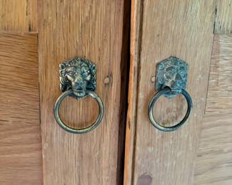 Nice lion pulls on oak closet