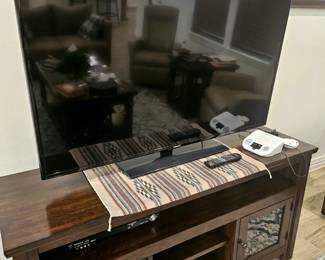 Console to match Cocktail and end tables. 60 inch samsung TV