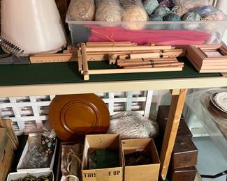 Crafting supplies; many skeins of yarn.