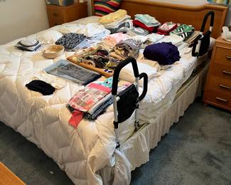 King-size bed with mattress and box spring.