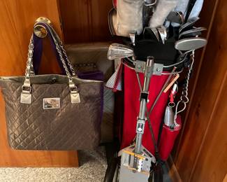 Vintage golf pull cart and set of Walter Hagen clubs.